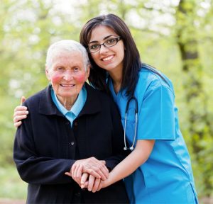 nurse-hugging-elderly-woman nurse-hugging-elderly-woman